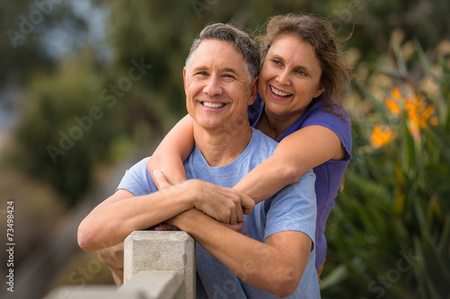 Portrait of an elder couple in a park