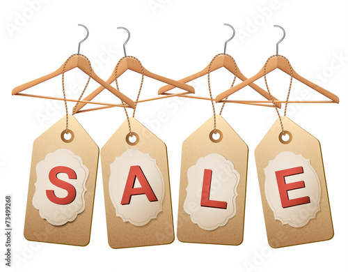Four wooden hangers with price tags forming the word Sale. Disco