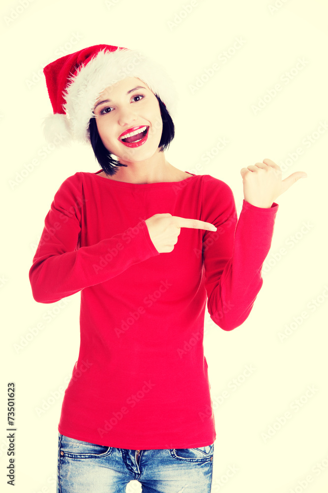 Santa woman pointing on side Santa woman pointing on side