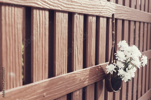 White flower in basket