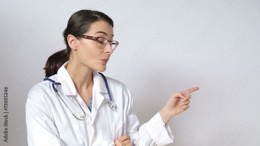 attractive female doctor looking straight at the camera attractive female doctor looking straight at the camera
