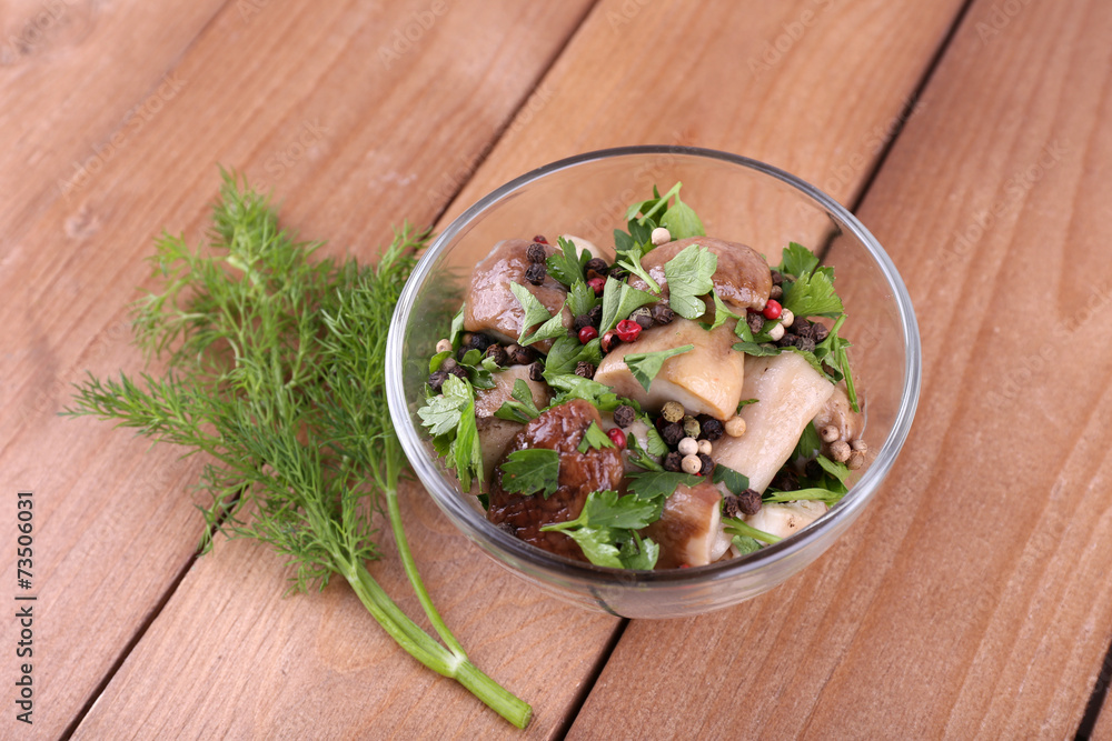 Braised wild mushrooms with vegetables and spices in bowl Braised wild mushrooms with vegetables and spices in bowl