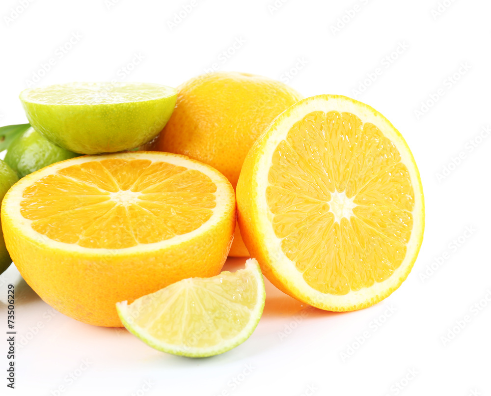Fresh juicy limes and oranges isolated on white