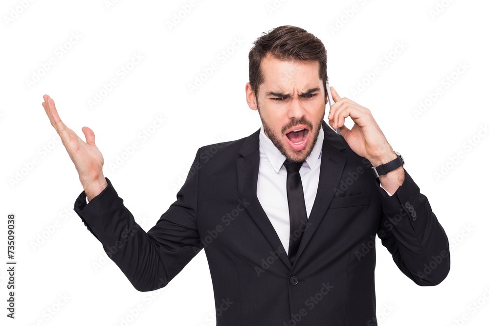 Angry businessman gesturing on the phone Angry businessman gesturing on the phone