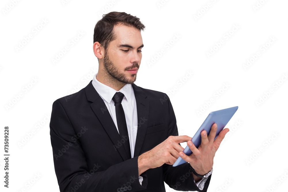 Cheerful businessman touching digital tablet Cheerful businessman touching digital tablet