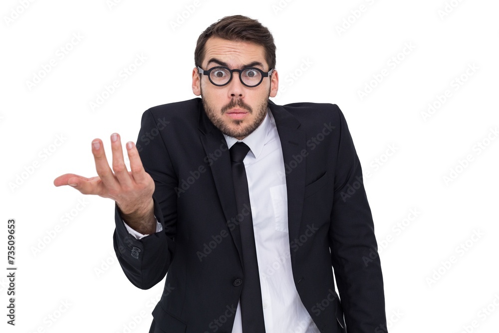 Doubtful businessman with glasses gesturing Doubtful businessman with glasses gesturing