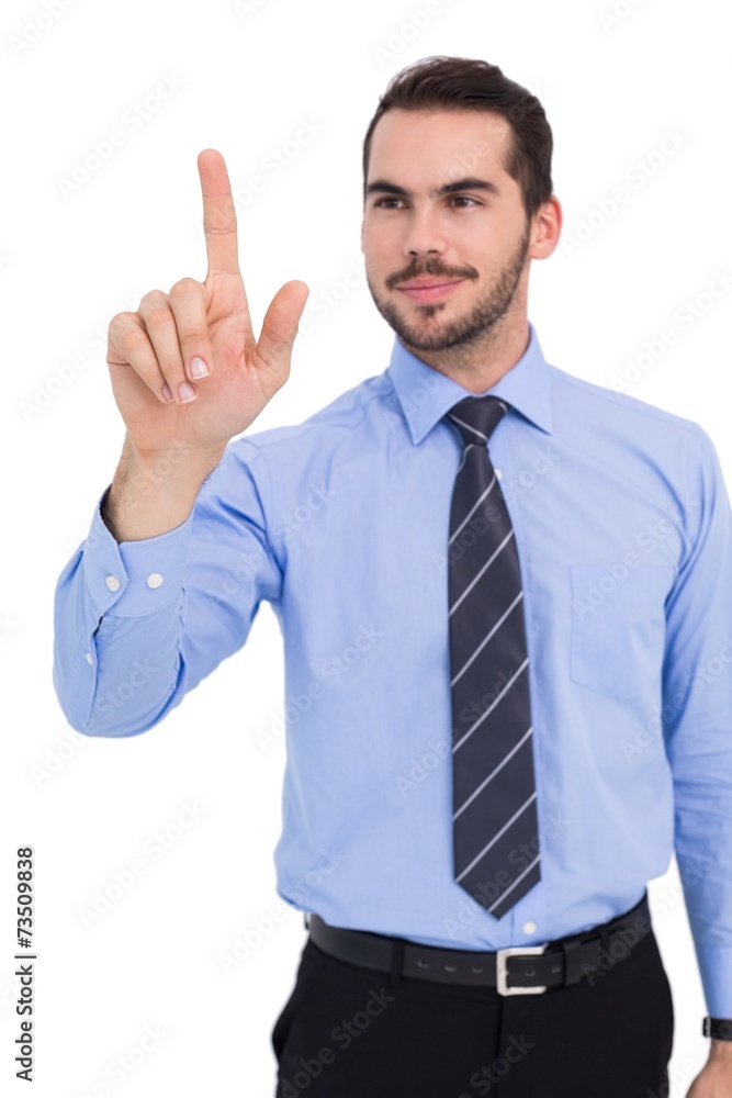 Happy businessman standing and pointing up Happy businessman standing and pointing up