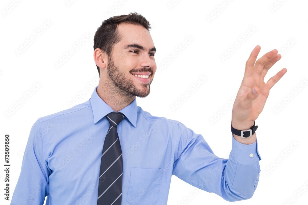Happy businessman catching something with his hand Happy businessman catching something with his hand