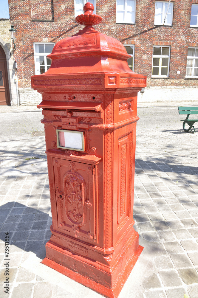 Post box ina a street of Bruges (Belgium) Post box ina a street of Bruges (Belgium)