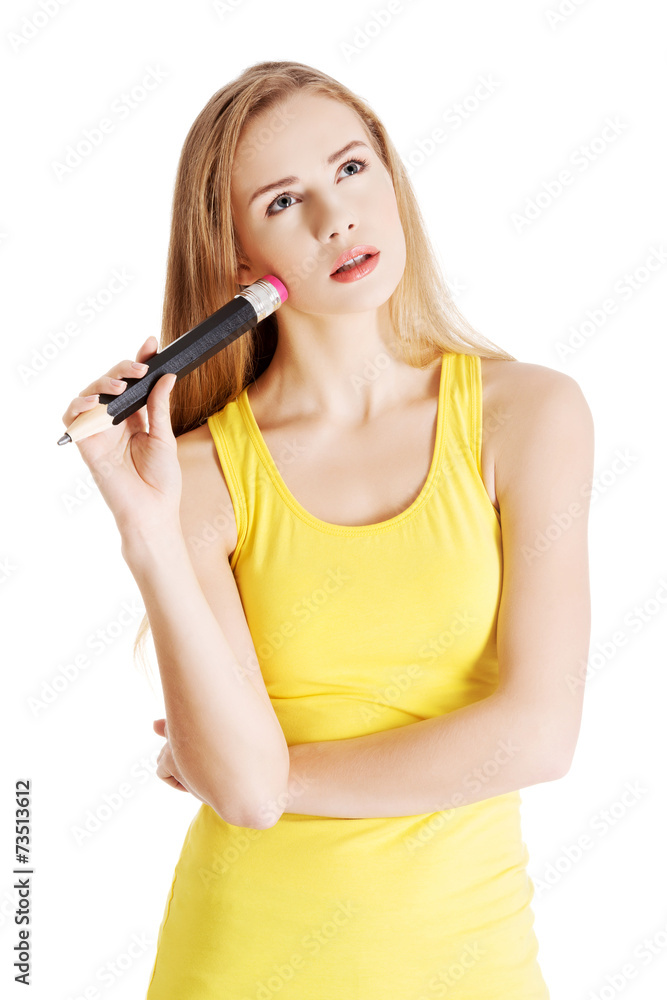 Thoughtful woman with big crayon Thoughtful woman with big crayon
