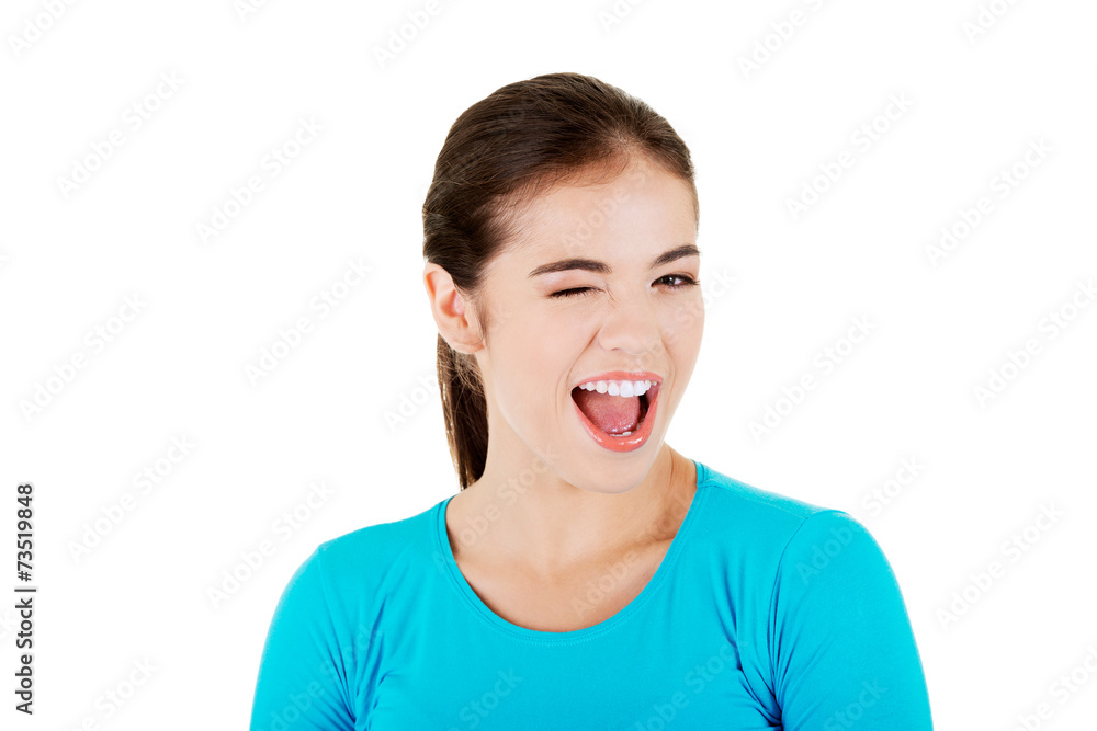 Portrait of a woman blinks her eye Portrait of a woman blinks her eye