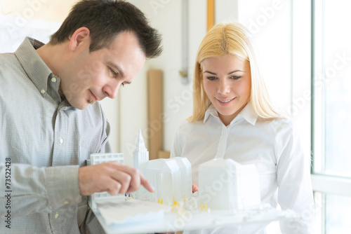 Architect Working on a model building