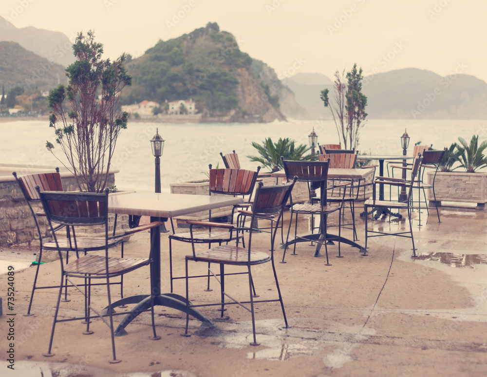 empty street cafe on the sea coast