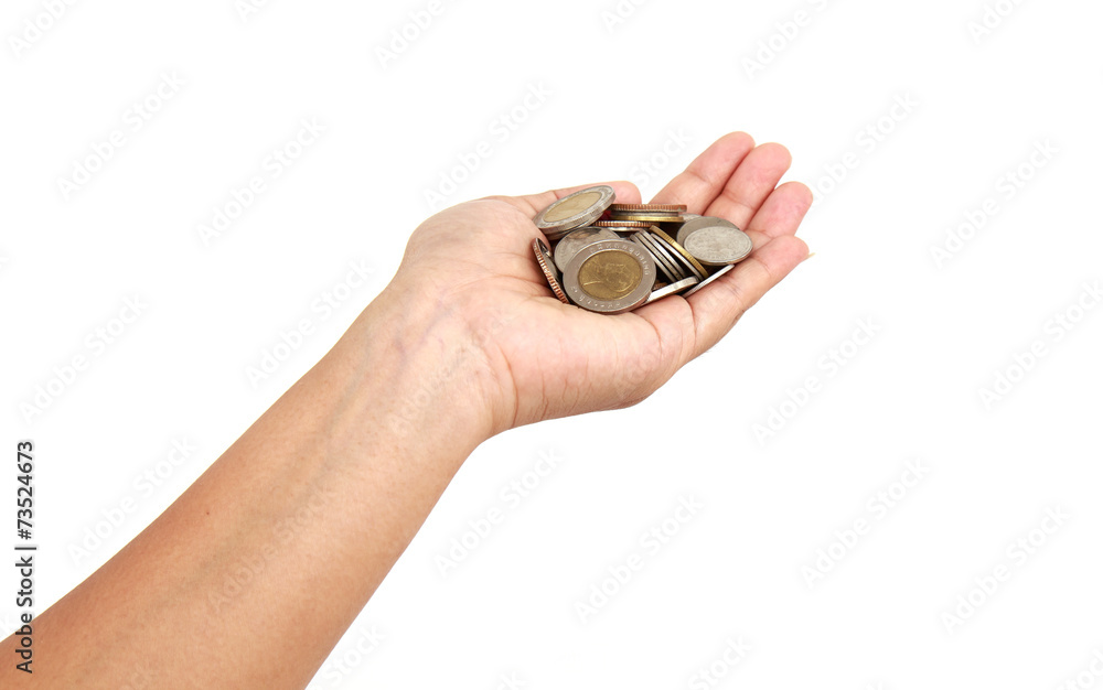 Woman hand holding coin isolates on white background