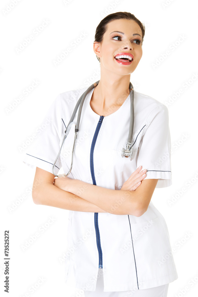 Happy female doctor with folded arms