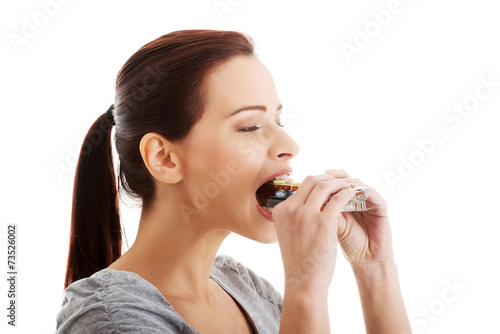 Woman eating too many pills
