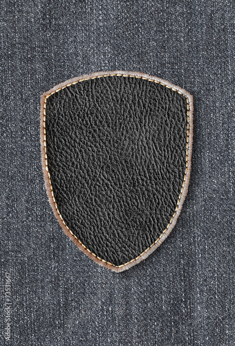 Leather patch on denim