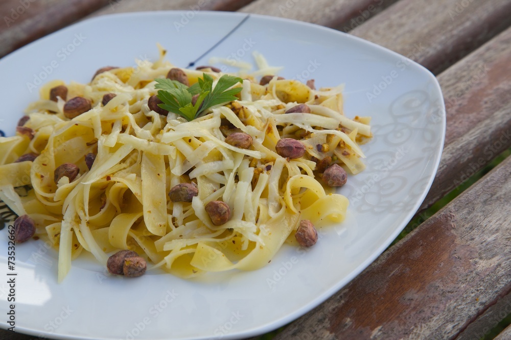 Italian pasta with pistachio pesto and parmesan