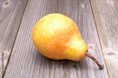Pear on wooden background