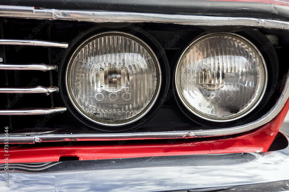 Closeup of the headlights of car