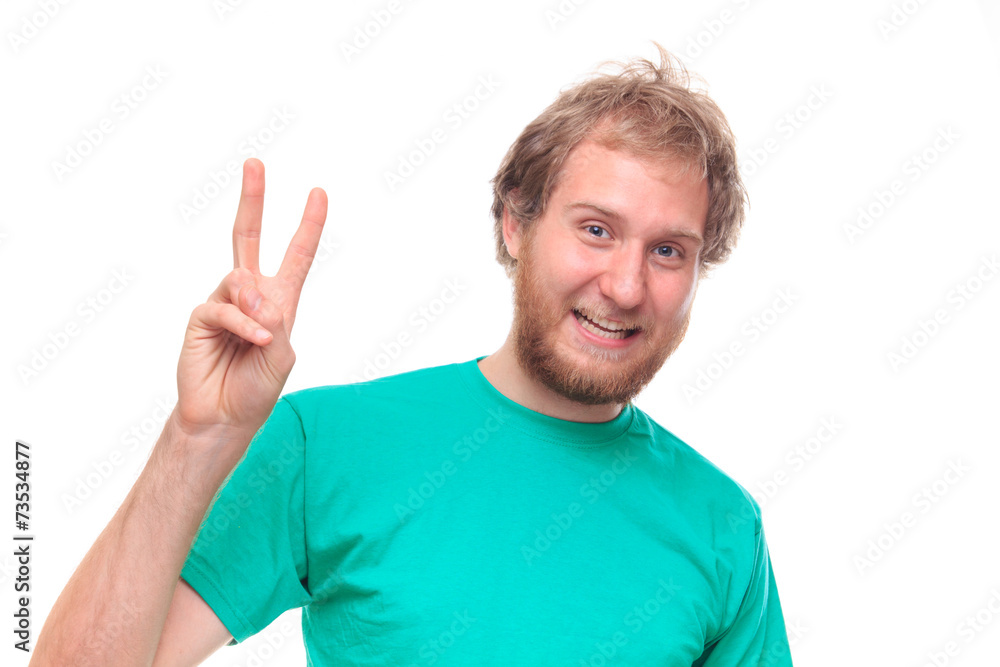Bearded happy man showing victory sign Bearded happy man showing victory sign