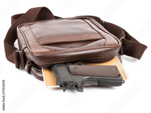 Brown messenger bag with gun hidden