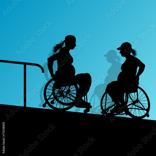 Active disabled young pregnant women in a wheelchair detailed he