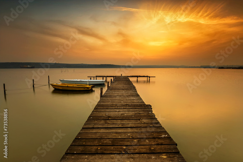 Sunset view with boats at a lake coast near Varna, Bulgaria © Jess_Ivanova