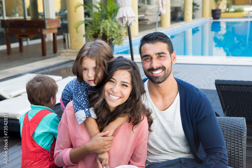 Family close to the pool