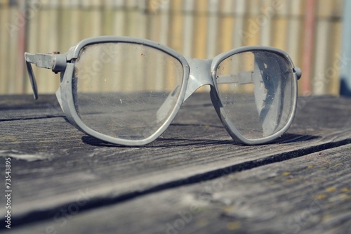 Vintage glasses on a wooden table