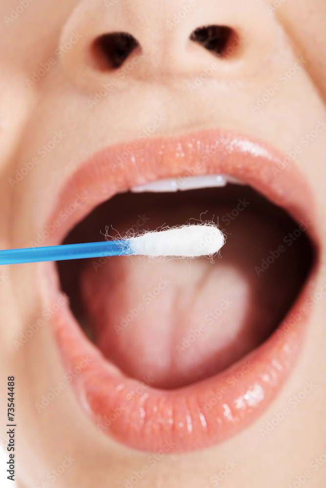 Fototapeta premium Woman getting swab by cotton pad