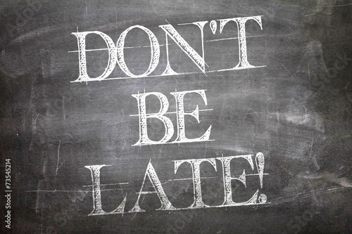 фотографія Don't Be Late written on blackboard