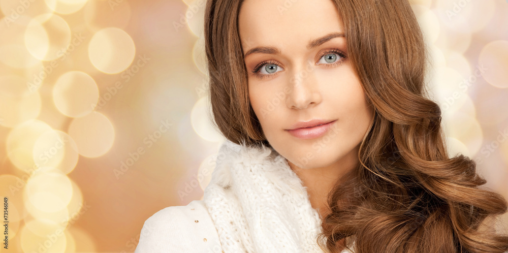 Fototapeta premium close up of smiling young woman in winter clothes