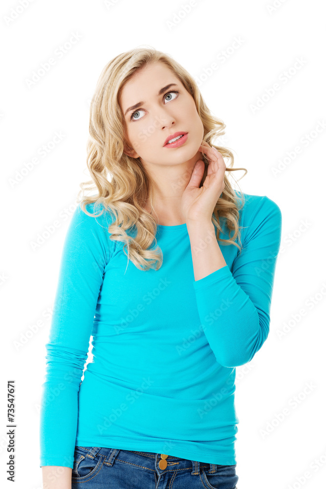 Portrait thoughtful woman scratching her neck Portrait thoughtful woman scratching her neck