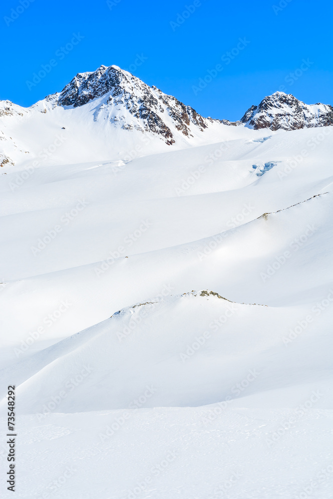 Fototapeta premium Snow covered mountains in winter ski resort of Pitztal, Austria