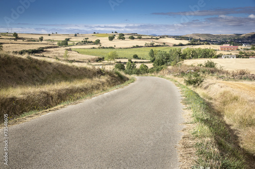 a rural road through the countryside