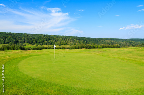 Golf course on sunny summer day in Arlamow village, Poland