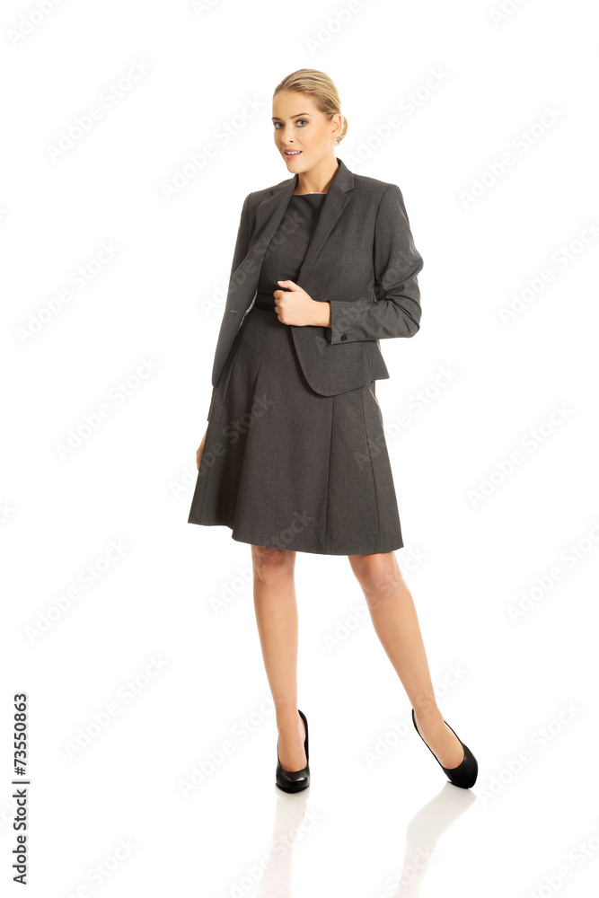 Businesswoman standing in confident pose Businesswoman standing in confident pose