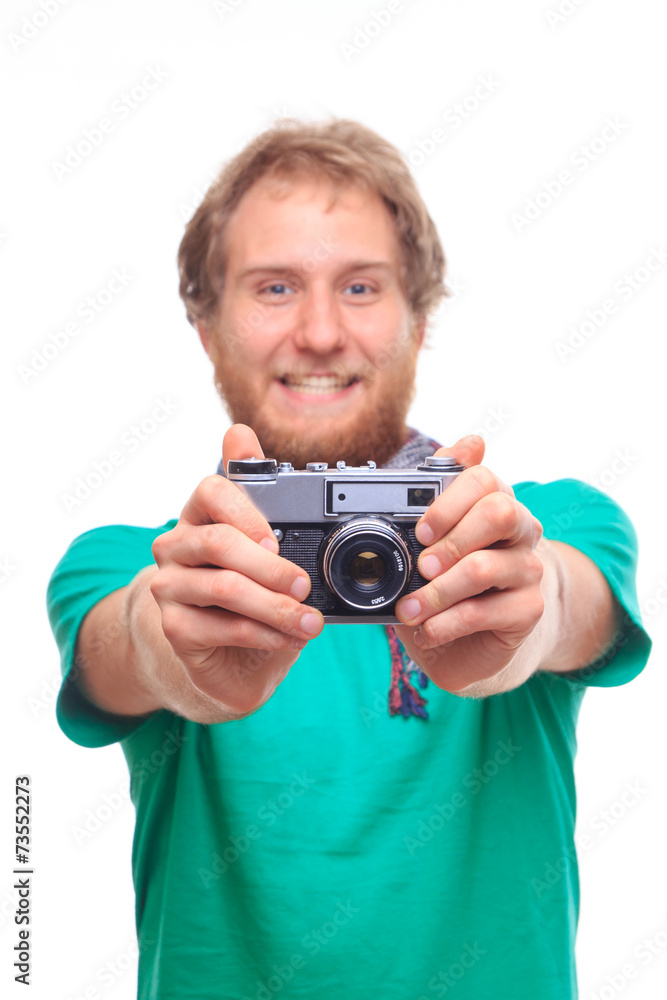 Portrait of cheerful photographer with camera Portrait of cheerful photographer with camera