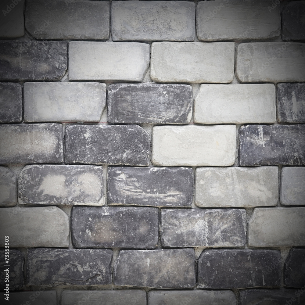 Obraz premium grey brick wall useful for background