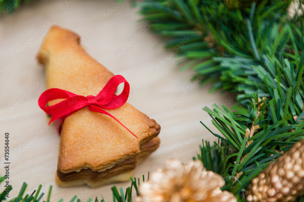 Christmas wreath with cookies over Wooden Background Christmas wreath with cookies over Wooden Background