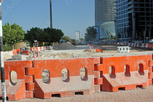Close-up of orange barriers at road works