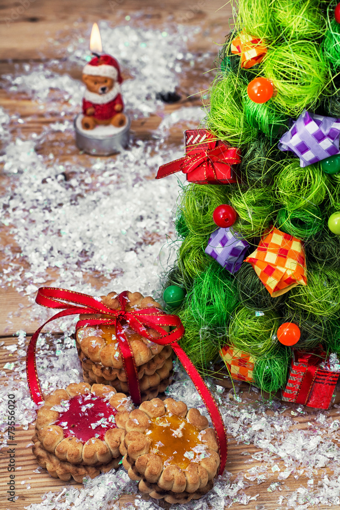fragrant cookies on background of decorated Christmas ornaments