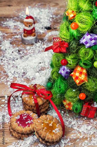 fragrant cookies on background of decorated Christmas ornaments