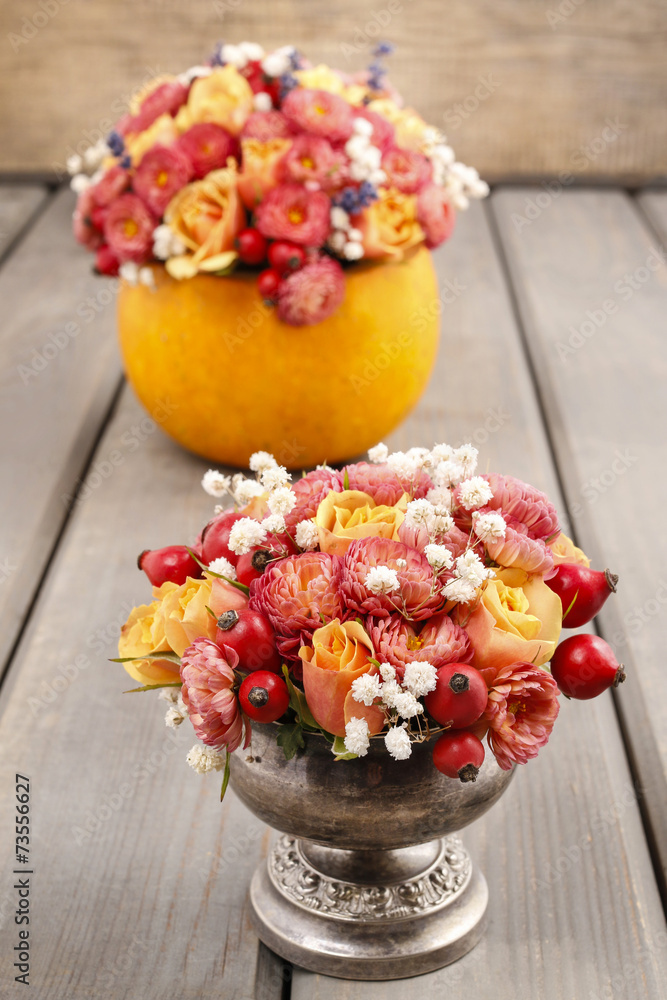 Bouquets of flowers: in pumpkin and in silver goblet