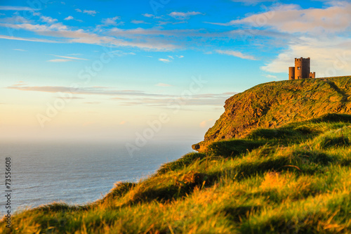 Cliffs of Moher at sunset - O Briens Tower in Co. Clare Ireland.