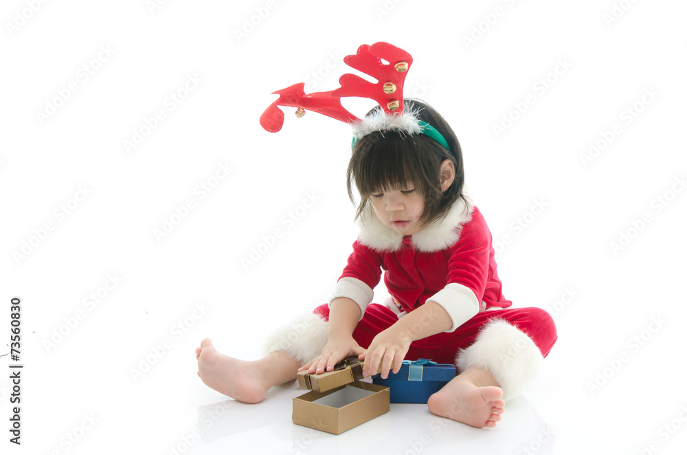 Cute asian baby wearing santa costume with present Cute asian baby wearing santa costume with present