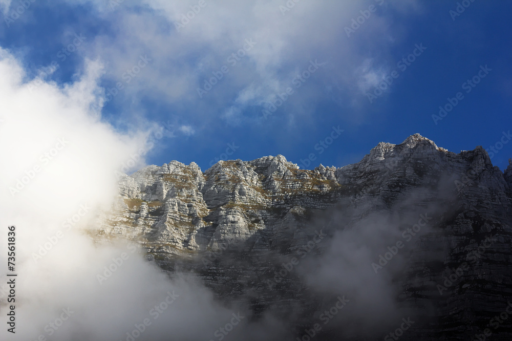 Montasio mountain, Italy, surrounded by clouds