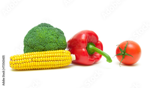 corn on the cob  broccoli  cherry tomatoes and sweet peppers iso