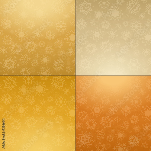 Four vector christmas backgrounds in warm colors with snowflakes